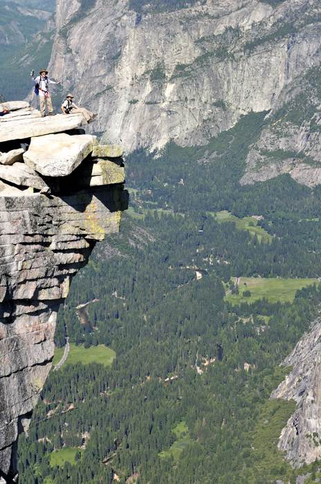 Hikers Standing on the Visor Portion of Half Dome's Summit